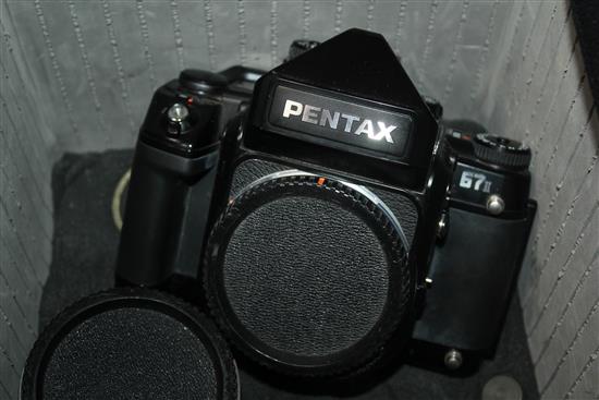 An Asahi Pentax 6 x 7 format camera and a Pentax 67 II camera and lenses,